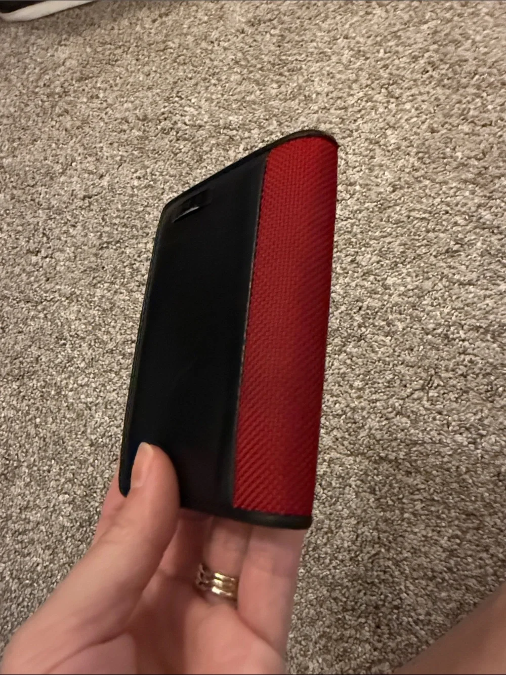 Tumi Black Leather Trifold Wallet with Red Fabric Trim